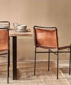 Nkuku New Arrivals Nirmi Leather Sling Back Dining Chair 11 Nkuku New Arrivals Nirmi Leather Sling Back Dining Chair