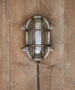 Nkuku Oshi Brass Oval Outdoor Bulkhead Light - Iron